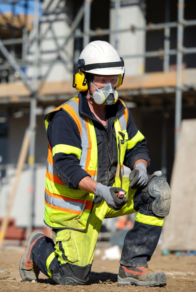 Groundworker working on construction site
